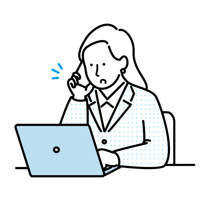 イメージ：電話で緊急の連絡をする会社員